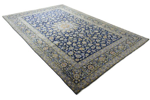 Close-up detail of 2000s Kashan rug from Iran / Persia showing Wool weave