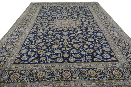Surface texture of 2000s Kashan rug with natural Wool and intricate pattern