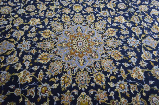 Central medallion detail of 2000s Kashan rug from Iran / Persia