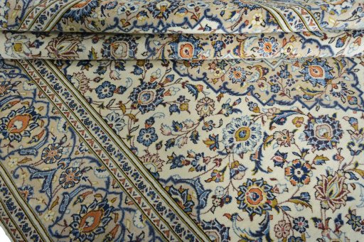 Close-up detail of 2000s Kashan rug from Iran / Persia showing Wool weave