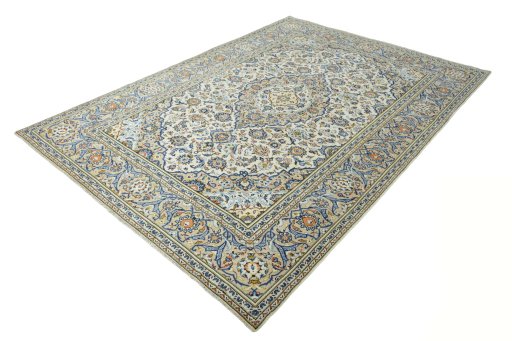 Corner detail of 2000s Kashan rug showing border pattern and Wool pile