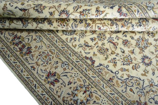 Close-up detail of 2000s Kashan rug from Iran / Persia showing Wool weave