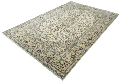 Corner detail of 2000s Kashan rug showing border pattern and Wool pile