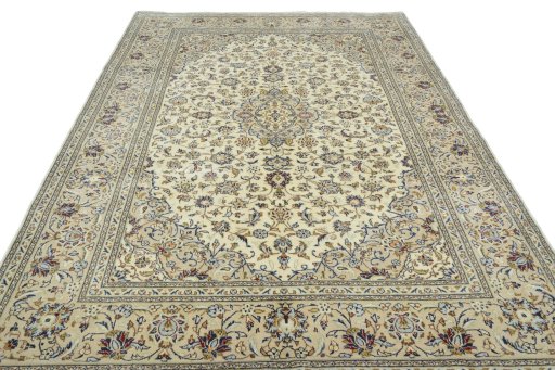 Surface texture of 2000s Kashan rug with natural Wool and intricate pattern