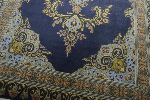 Close-up detail of 2000s Kashan rug from Iran / Persia showing Wool weave