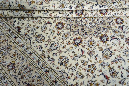 Close-up detail of 2000s Kashan rug from Iran / Persia showing Wool weave