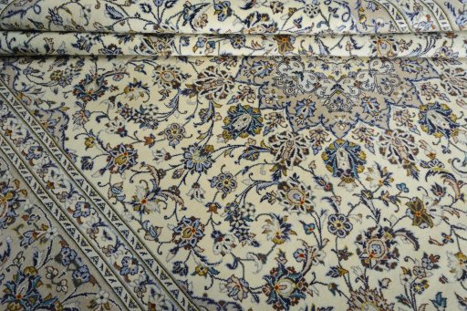 Close-up detail of 2000s Kashan rug from Iran / Persia showing Wool weave