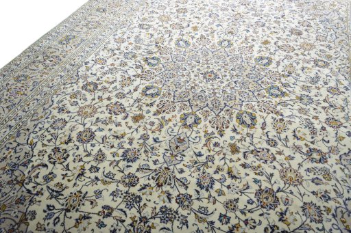 Backside of handmade 2000s Kashan rug showing knot structure and weave density