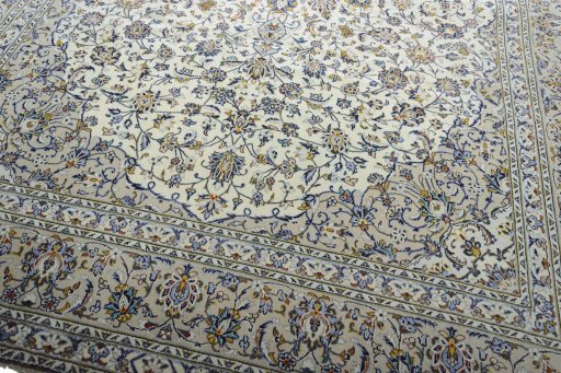 Close-up detail of 2000s Kashan rug from Iran / Persia showing Wool weave