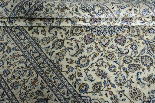 Close-up detail of New Kashan rug from Iran / Persia showing Wool weave