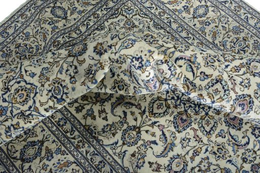 Surface texture of New Kashan rug with natural Wool and intricate pattern
