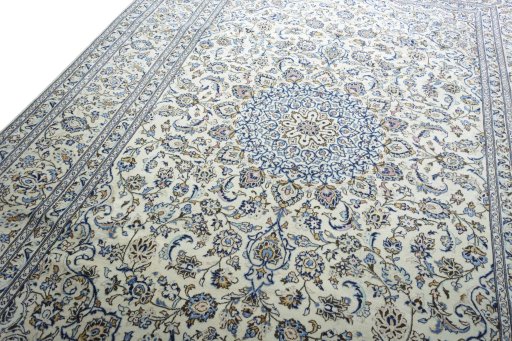 Backside of handmade New Kashan rug showing knot structure and weave density