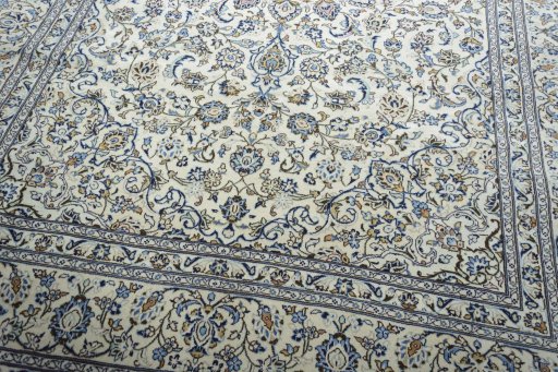 Close-up detail of New Kashan rug from Iran / Persia showing Wool weave