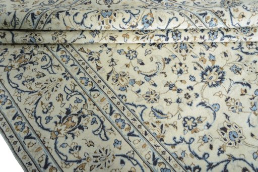 Close-up detail of 2000s Kashan rug from Iran / Persia showing Wool weave