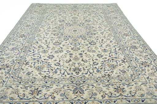 Surface texture of 2000s Kashan rug with natural Wool and intricate pattern
