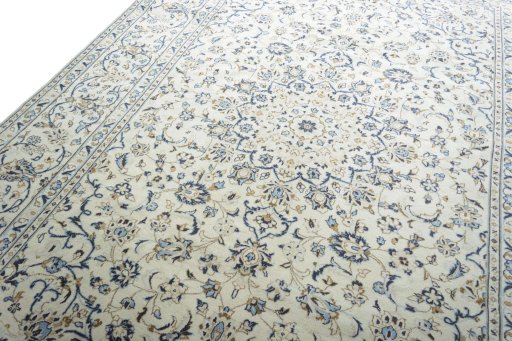 Backside of handmade 2000s Kashan rug showing knot structure and weave density