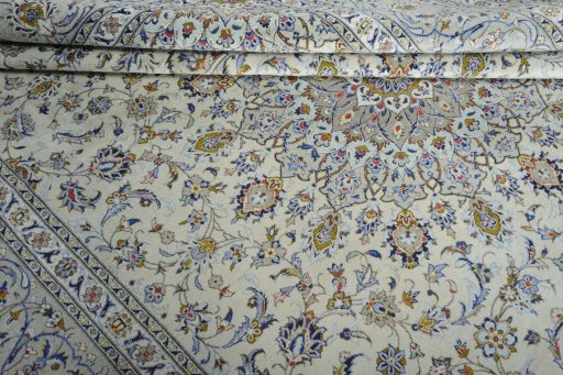 Close-up detail of 2000s Kashan rug from Iran / Persia showing Wool weave
