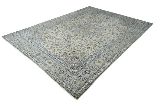 Corner detail of 2000s Kashan rug showing border pattern and Wool pile