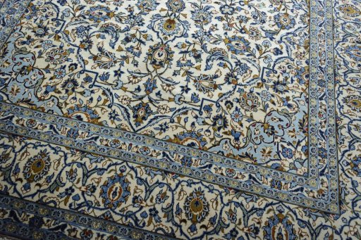 Close-up detail of 2000s Kashan rug from Iran / Persia showing Wool weave