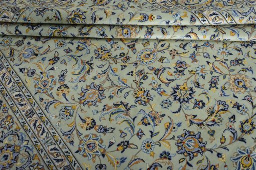 Close-up detail of 2000s Kashan rug from Iran / Persia showing Wool weave