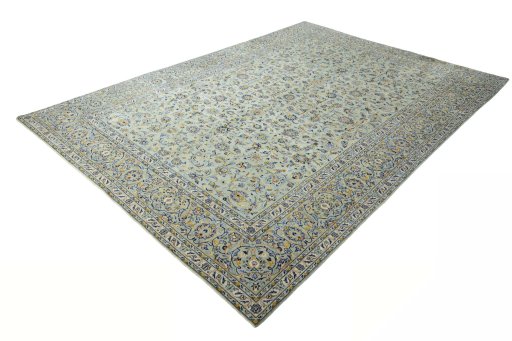 Corner detail of 2000s Kashan rug showing border pattern and Wool pile