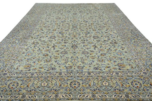 Surface texture of 2000s Kashan rug with natural Wool and intricate pattern