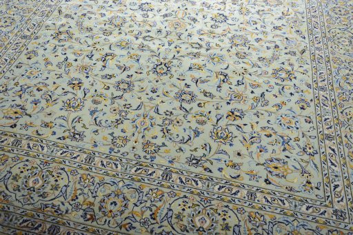 Close-up detail of 2000s Kashan rug from Iran / Persia showing Wool weave