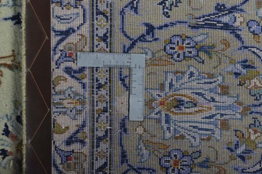Backside of handmade 2000s Kashan rug showing knot structure and weave density