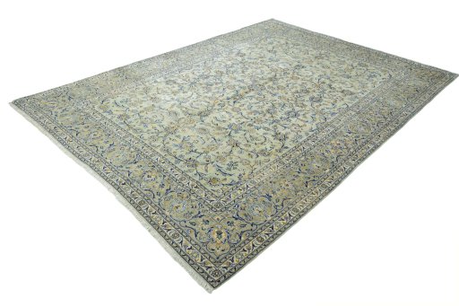 Corner detail of 2000s Kashan rug showing border pattern and Wool pile