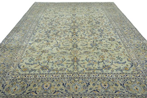 Surface texture of 2000s Kashan rug with natural Wool and intricate pattern
