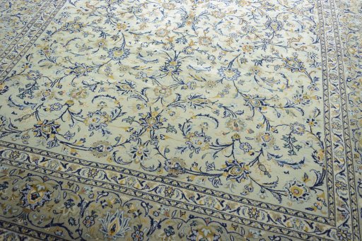 Close-up detail of 2000s Kashan rug from Iran / Persia showing Wool weave
