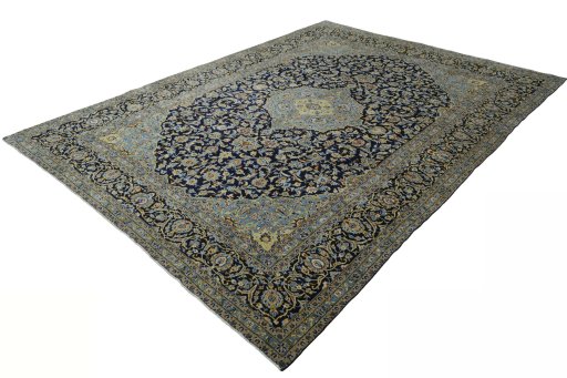 Corner detail of 2000s Kashan rug showing border pattern and Wool pile