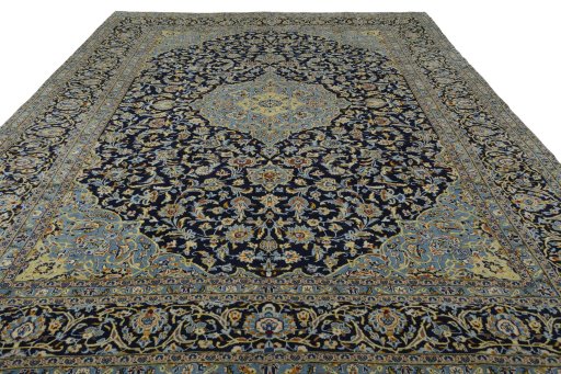 Surface texture of 2000s Kashan rug with natural Wool and intricate pattern