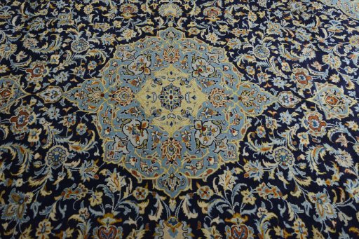 Central medallion detail of 2000s Kashan rug from Iran / Persia