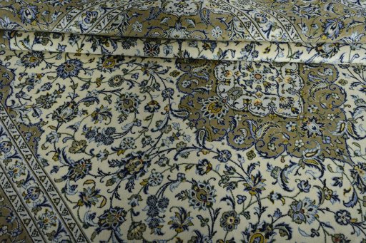 Close-up detail of 2000s Kashan rug from Iran / Persia showing Wool weave
