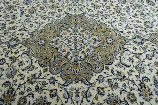 Central medallion detail of 2000s Kashan rug from Iran / Persia