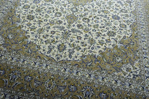 Close-up detail of 2000s Kashan rug from Iran / Persia showing Wool weave
