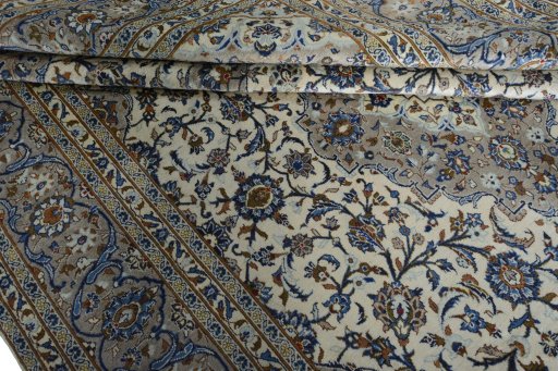 Close-up detail of 2000s Kashan rug from Iran / Persia showing Wool weave