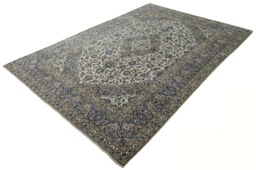 Corner detail of 2000s Kashan rug showing border pattern and Wool pile