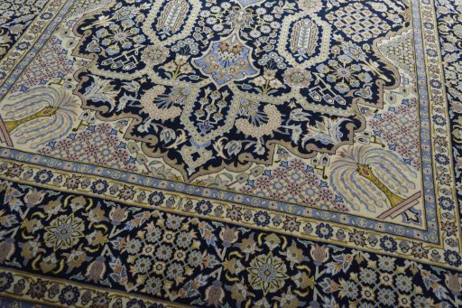 Close-up detail of 2000s Kashan rug from Iran / Persia showing Wool weave
