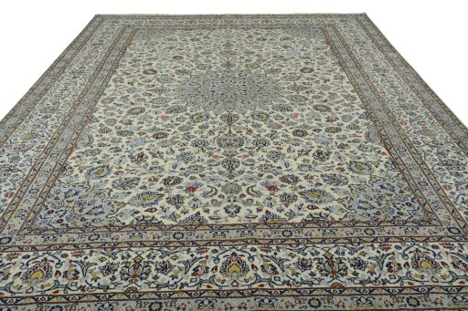 Surface texture of 2000s Kashan rug with natural Wool and intricate pattern