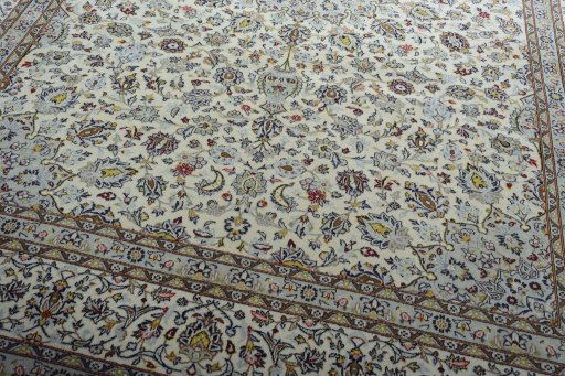 Close-up detail of 2000s Kashan rug from Iran / Persia showing Wool weave