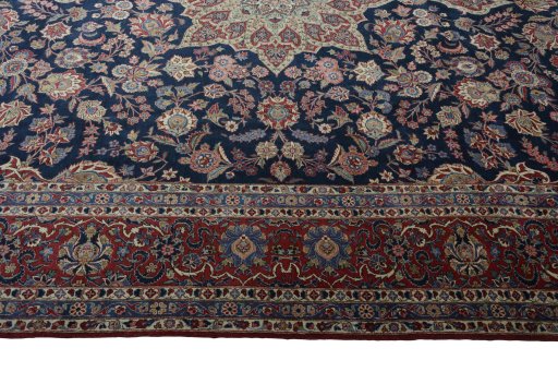 Corner detail of 1930s Kashan rug showing border pattern and Wool pile