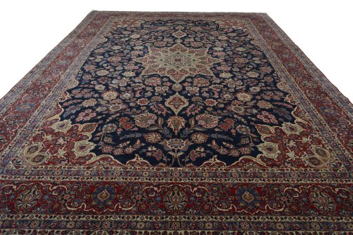 Surface texture of 1930s Kashan rug with natural Wool and intricate pattern