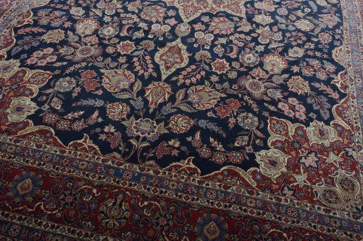Close-up detail of 1930s Kashan rug from Iran / Persia showing Wool weave