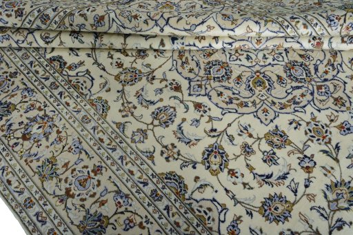 Close-up detail of 2000s Kashan rug from Iran / Persia showing Wool weave