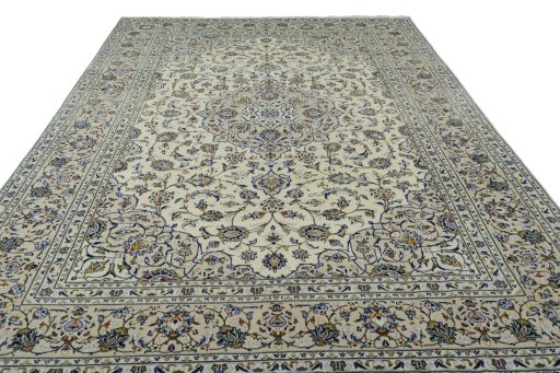 Surface texture of 2000s Kashan rug with natural Wool and intricate pattern