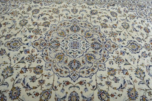 Central medallion detail of 2000s Kashan rug from Iran / Persia
