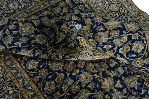 Surface texture of 2000s Kashan rug with natural Wool and intricate pattern