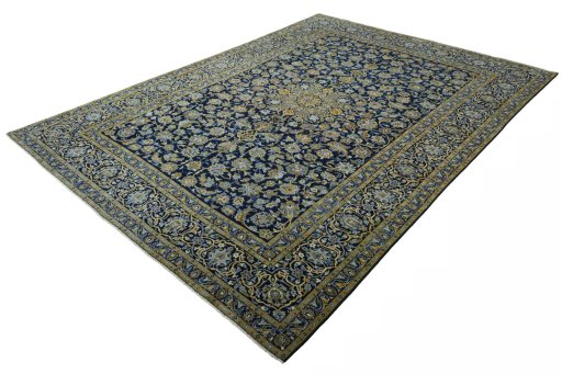 Corner detail of 2000s Kashan rug showing border pattern and Wool pile